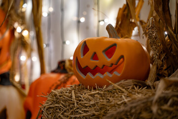Decorated Halloween Jack-o-Lantern Pumpkin at night time.