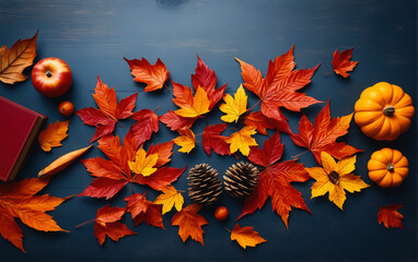 Autumn mood: a cozy flatlay with bright orange flowers, a cup of hot tea or coffee and a knitted blanket on a gray tabletop, top view.