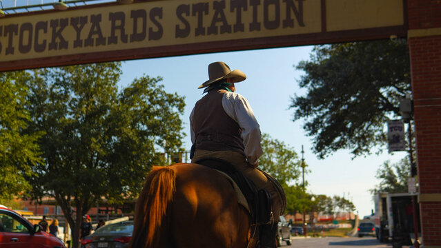 Cowboy riding a horse at the Fort Worth Stockyards, Texas USA