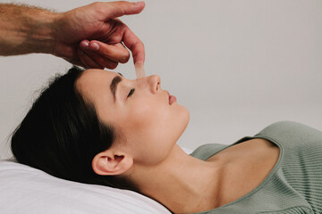 Bandaging nose after rhinoplasty or septoplasty to prevent bleeding and bruising. Proper care of...
