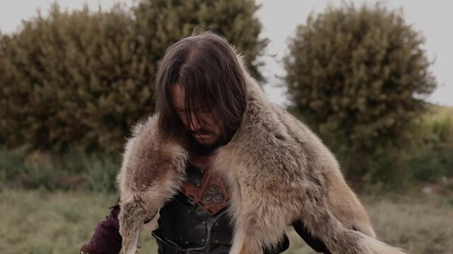 Barbarian warrior wears the wolf's skin