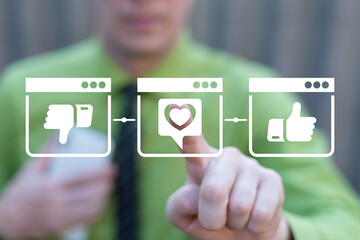 Business man in green shirt using virtual touch screen presses icon: speech bubble with heart....