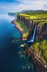 Scenic Waterfall Over Rugged Cliffs and Ocean View