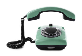 Old aquamarine telephone with rotary dial isolated on white