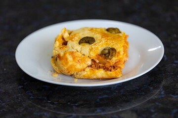 Traditional chicken pie with typical Brazilian catupiry. Empadão de frango
