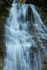 Cascading Waterfall in Rocky Landscape