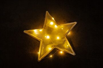 Christmas star ice cream sticks handmade Storytelling creating craft Christmas holiday decoration. Tactile hand-on activity. Master class progress of creative me-made gifts. Seasonal domestic life