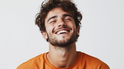 Obraz premium Portrait of a happy handsome man in a shirt with laughing