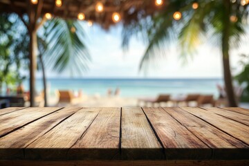 Empty wooden table with blurred beach background.