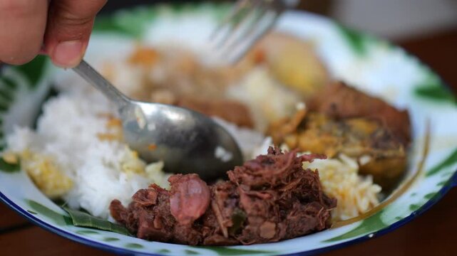 Eating gudeg a yogyakarta traditional food