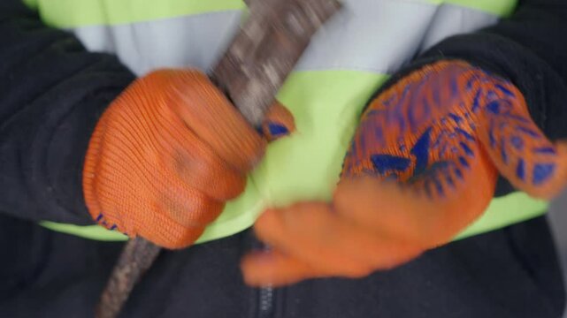 Aggressive Industrial Worker Rapidly Hitting Wrench Against Palm | Construction Site Anger Management Issue | Heavy Tool Threatening Gesture Close-up