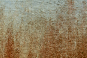 Texture of brick wall with worn white plaster, dull brick wall, reddish brown spots, dirty wall with clay