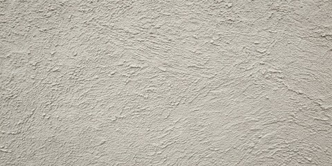 Fototapeta premium A Textured Wall Surface, Featuring a Rough, Unpolished Appearance, Displaying a Subtle Pattern of Irregularities, With a Light Grey Hue Providing a Minimalist Aesthetic.