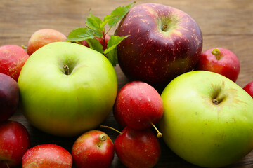 variety of ripened apples, food background 
