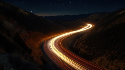 Fototapeta premium Nighttime Car Trails in Mountain Pass, dynamic light streaks weave through dark landscapes, showcasing the beauty of nocturnal travel.
