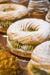 A Delicious and Beautiful Pastry Featuring Matcha Cream and Sprinkled Powdered Sugar on Display