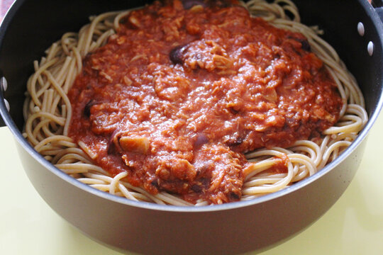 Spaghetti with bolognese saude. Pasta detail. Brazilian cuisine in the pot.