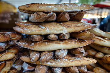Paris,France - October 6, 2024: Baguette or a long, thin, crusty French bread sold at a marche in...