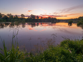 Sunset by the River with Reflections