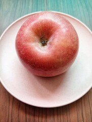 Portrait of an apple on the table