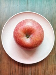 Portrait of an apple on the table