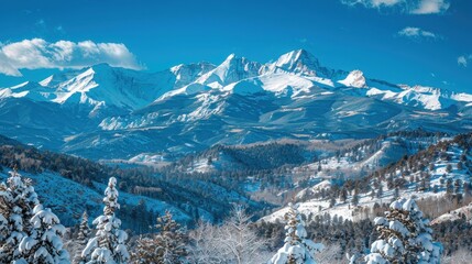 Snow-Capped Mountains Under a Clear Blue Sky
