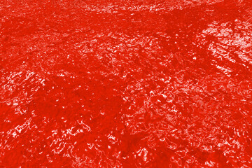 緩やかに波打つ真っ赤な水面テクスチャ