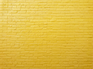 Yellow painted brick wall	
