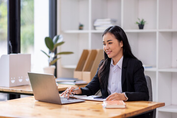 Businessman working at office with documents on his desk, doing planning analyzing the financial report, business plan investment, finance analysis concept
