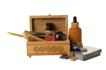 PNG, wooden box with witchcraft accessories isolated on white background.