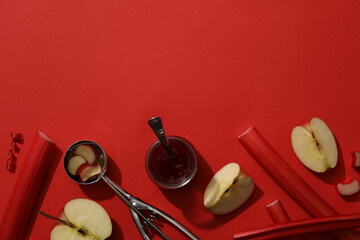 Fresh stalks of rhubarb with fresh apples