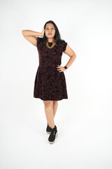 Fototapeta premium fashion portrait women evening party wear brown velvet dress with black velvet high heel shoes, wrist watch, short hair, isolated over white background.