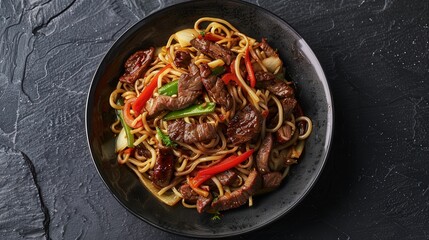 Delectable Stir-Fry Noodles with Vegetables and Tender Beef in a Black Bowl 