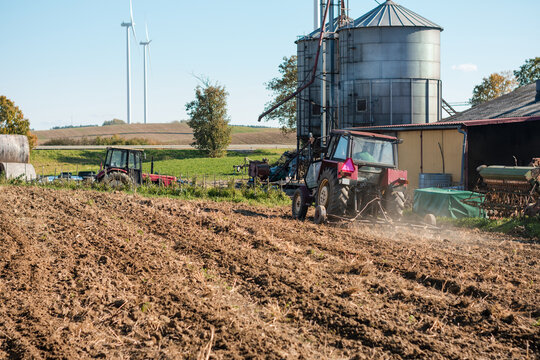 Farm with a tractor and a silo