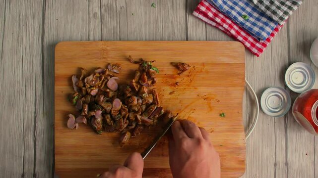 Chicken gizzard and liver cooking.