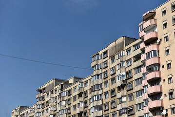 Typical facade of concrete panel building. Post Soviet flat of blocks