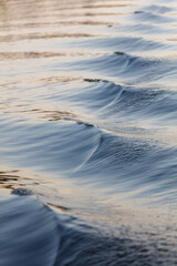 The water is calm and the waves are small