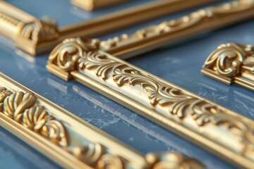 A close-up shot of a gold frame on a blue surface, ideal for use in jewelry or design related contexts