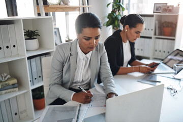 Paperwork, writing or businesswoman on laptop for administration, networking website or internet....