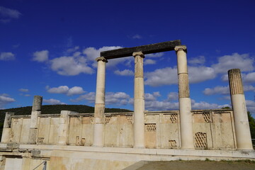 Fototapeta premium Ruins of the colonnade over the underground Avaton, where patients were healed by the god Asclepius in the Epidavros archaeological site