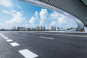 Asphalt road and bridge with modern city skyline scenery in Guangzhou. road trip.