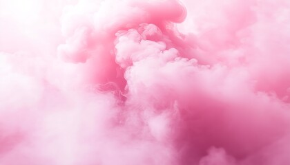 Fototapeta premium Ethereal pink smoke fills the frame, creating a dreamy and soft-textured background perfect for artistic projects or design inspiration.