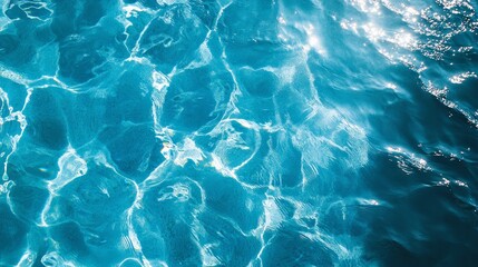 Fototapeta premium Abstract Blue Water Surface Texture with Light Reflections Swimming Pool Ocean Backgro
