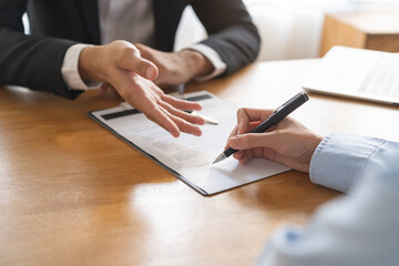 Business car rent, sell service, hand of agent dealer, male giving auto key of vehicle to customer...