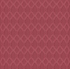 Fototapeta premium Cable knitted fabric with a pattern—winter clothes close-up Fabric.