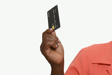 Close-up of African American female hand showing a bank credit card. Detailed photo of a woman swiping a credit card.Black card