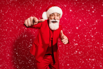 Photo of positive cool old retired man point finger you cool good mood smile isolated on red color background