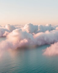 Fototapeta premium Aerial View of Fluffy Clouds Above the Sea at Sunset.