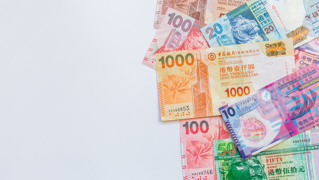 Hong Kong Dollar banknotes money currency white background, Hong Kong banknotes HKD currency financial and business, Hong Kong banknotes cash money currency with copy space.