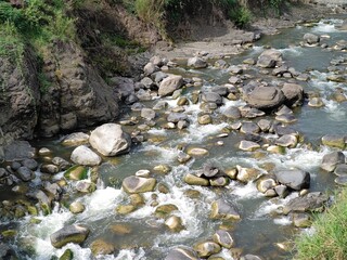 AESTHETIC ARCHITECTURE NATURAL rocks that are in the river and are a challenge for white water...